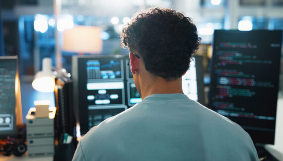 Office, Man And Programmer With Computer Screen For Coding, Backend Script And Engineer At Night. Back, Business Person And Developer With Digital For Software Development, System Update And Testing