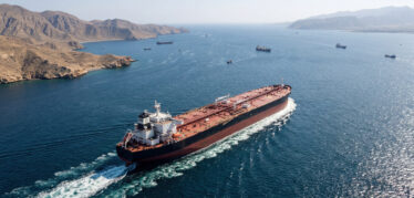 Large Oil Tanker Sailing Through The Strait Of Hormuz Into The Persian Gulf