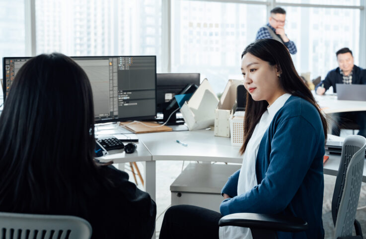 Young Business People Working In Office